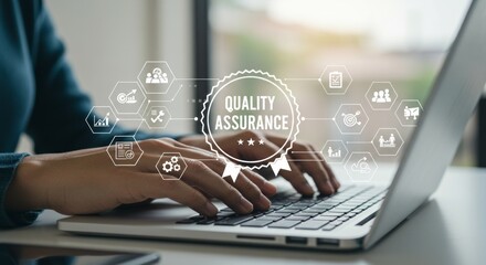 Person Typing on Laptop with Quality Assurance Graphic Overlay