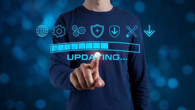 Person pointing at a digital progress bar indicating software updating with various technology icons displayed above