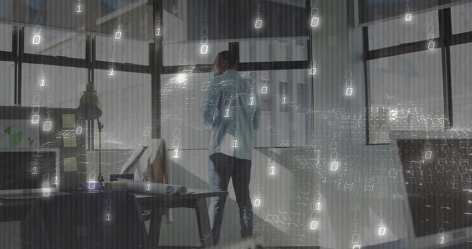 Mature man at desk gazing through window, causing binary digits swirling for data analysis