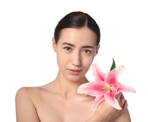Fototapeta premium Portrait of beautiful woman with lily flower after spa treatment on white background, closeup