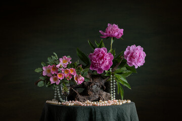 wild rose, peonies, floral contrast, thorns, softness, phytodesign, artistic composition, botanical beauty, rugged elegance, delicate petals, driftwood, branches, floral harmony, nature-inspired, ench