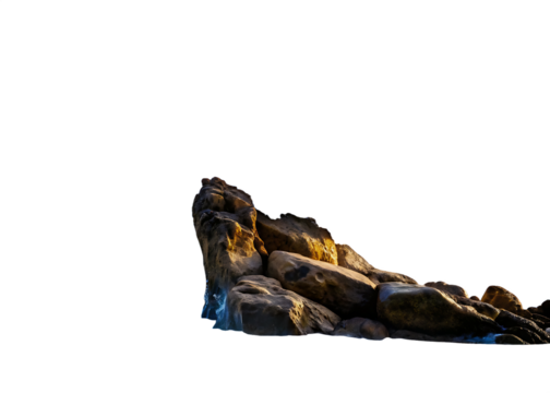 Jagged rocks with crashing blue water splash and golden light isolated on a transparent background rock formation