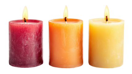 Three pillar candles with glowing flames beautifully illuminated for a warm and peaceful ambiance on white background
