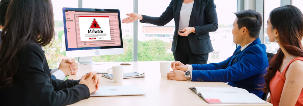 Cyber attacking concept. Malware alert showing on computer screen display scam and threat detection on computer system or online server to be removed snugly. - Powered by Adobe