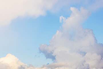 Blue sky with soft white clouds on bright sunny day in peaceful weather with clean atmospheric view. Sweden.