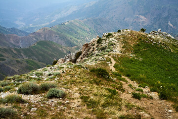 Breathtaking panoramic view of the picturesque Western Ridge, seen descending from Big Chimgan,...