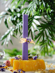 Beautiful pink and purple handmade beeswax candles. Candles for Love, femininity and sexuality.  Aromatherapy. Wax candles. Selective focus