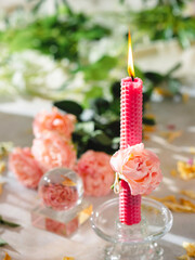 Beautiful pink and purple handmade beeswax candles. Candles for Love, femininity and sexuality.  Aromatherapy. Wax candles. Selective focus