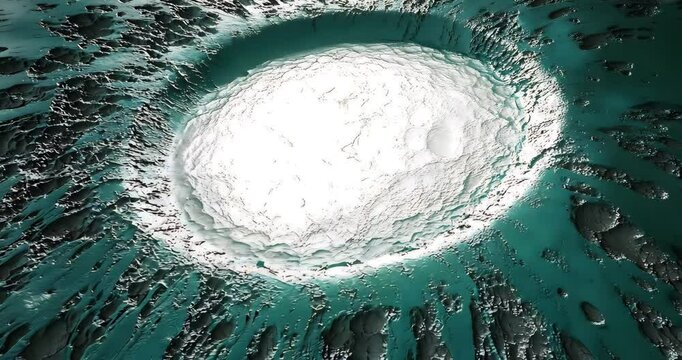 Close-up of a textured teal surface with a bright, circular indentation, resembling an alien landscape.