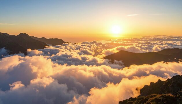 Mountain sunset through clouds