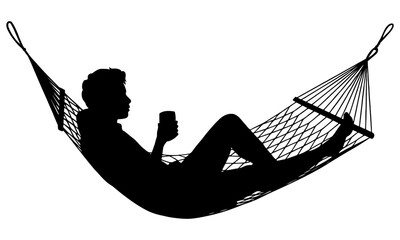 Silhouette of person in hammock drinking