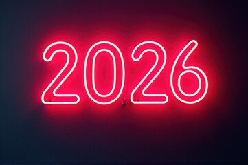 A bright neon sign displays the year 2026 against a dark background..New Year 2026.