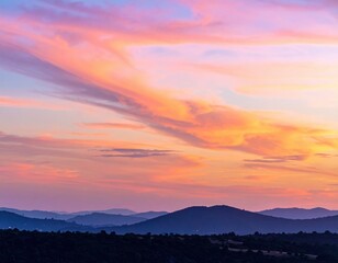Fototapeta premium Colorful Sunset Horizon: A stunning landscape featuring a vibrant sunset, painting the sky with streaks of pink, orange, and gold.