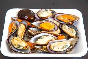 fresh Atlantic Ocean mussel in the shell, healthy food and rich in minerals and omega 3