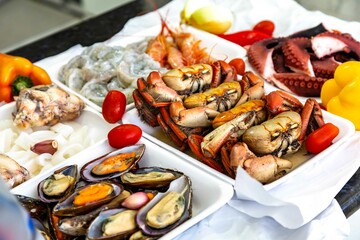 Traditional seafood paella ingredients with a variety of selected seafood. Refined and gourmet cuisine