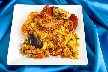 Traditional seafood paella with a variety of selected seafood. Refined and gourmet cuisine