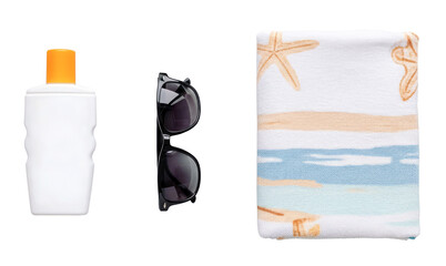 Sunscreen sunglasses and beach towel