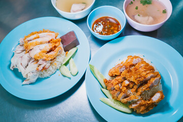 Kao Mun Kai Thaifood. Delicious Plates of Hainanese Chicken Rice with Crispy Chicken and Soup on a Dining Table