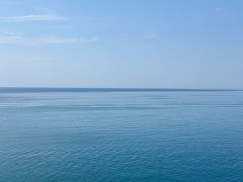 Sea light blue waters and clear sky.