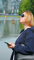 Close-up of a young woman with a phone5