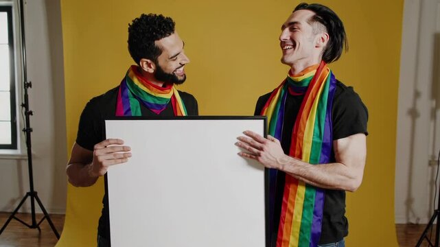 Transgender Male Couple Holding Poster