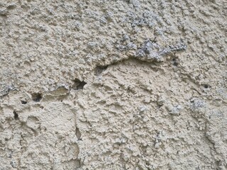 Texture - Old deteriorated brick house facade