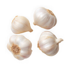 A close up shot of four garlic bulbs isolated on a white plain background