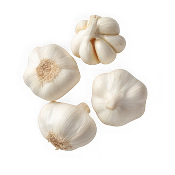 Four heads of garlic with white cloves arranged on a plain white background