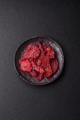 Jerky or dried chicken and cherry snacks. Dehydrated, dried snacks for beer