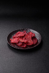 Jerky or dried chicken and cherry snacks. Dehydrated, dried snacks for beer