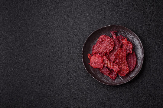 Jerky or dried chicken and cherry snacks. Dehydrated, dried snacks for beer