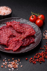 Jerky or dried chicken and cherry snacks. Dehydrated, dried snacks for beer