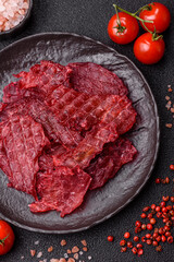 Jerky or dried chicken and cherry snacks. Dehydrated, dried snacks for beer