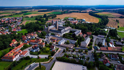 Aerial view around the old town in the city Schwarzach am Main on an sunny spring day in Germany