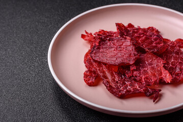 Jerky or dried chicken and cherry snacks. Dehydrated, dried snacks for beer