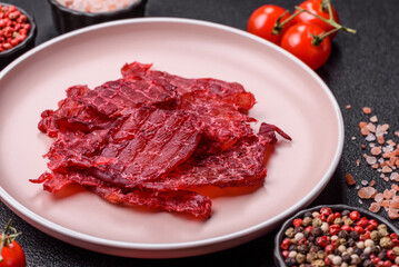 Jerky or dried chicken and cherry snacks. Dehydrated, dried snacks for beer