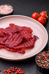 Jerky or dried chicken and cherry snacks. Dehydrated, dried snacks for beer