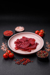 Jerky or dried chicken and cherry snacks. Dehydrated, dried snacks for beer
