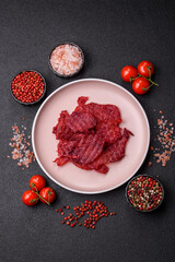 Jerky or dried chicken and cherry snacks. Dehydrated, dried snacks for beer