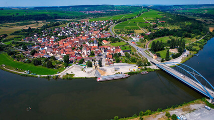 Aerial view around the old town in the city Astheim, beside Volkach on an sunny spring day in Germany