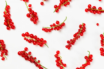 Red Currant Clusters Scattered On White Background