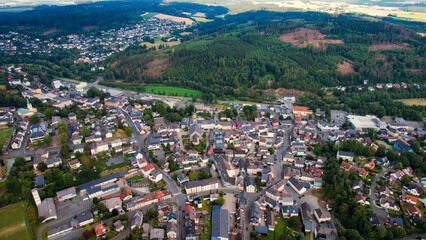 Aerial view around the old town in the city Naila on an cloudy spring day in Germany