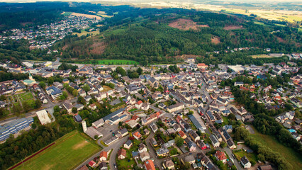 Aerial view around the old town in the city Naila on an cloudy spring day in Germany