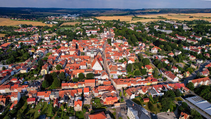 Aerial view around the old town in the city Neustadt an der Orla on an sunny spring afternoon