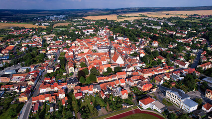 Aerial view around the old town in the city Neustadt an der Orla on an sunny spring afternoon