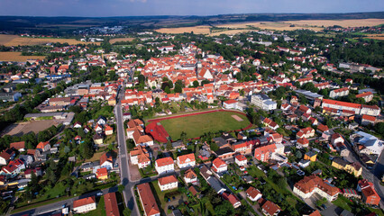 Aerial view around the old town in the city Neustadt an der Orla on an sunny spring afternoon