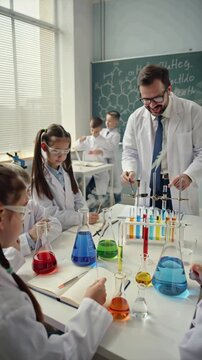 children, laboratory, education, experiment, science, chemical, classroom, equipment, learning, lesson, learn, indoor, cognition, boy, girl, test, scientist, man, person, male, study, research, scient