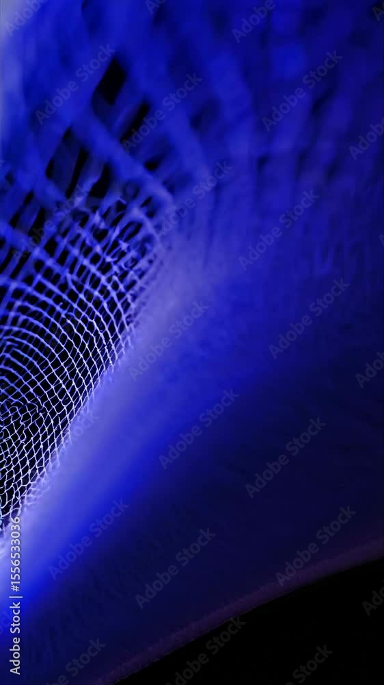 Aufkleber dynamic wave of glowing dots on a black background, captured from a low-angle, creating a futuristic