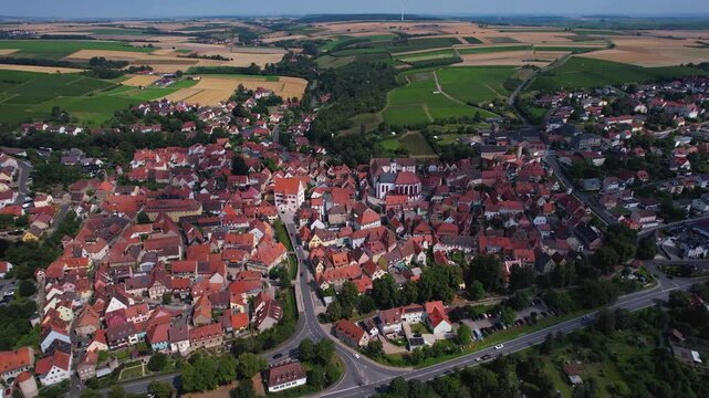 A panoramic aerial view of the city Dettelbach in Germany on a sunny day in spring