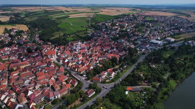 A panoramic aerial view of the city Dettelbach in Germany on a sunny day in spring